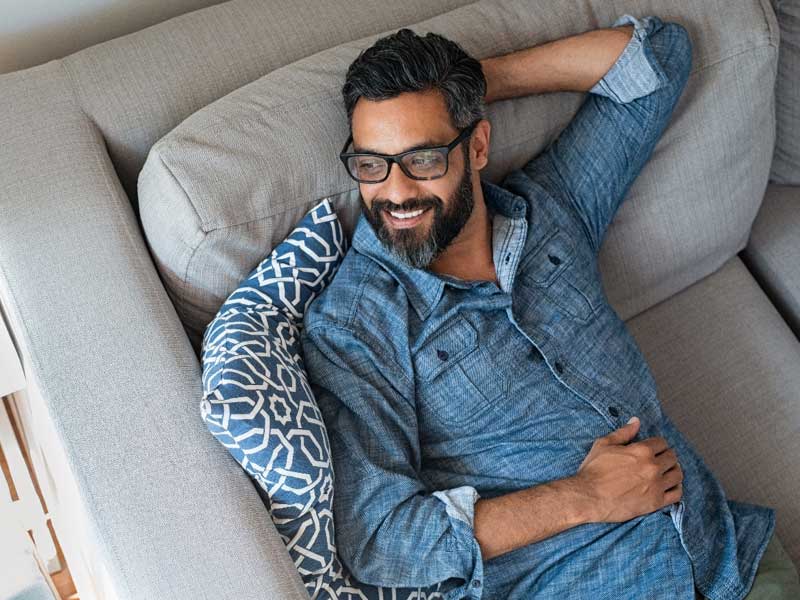 Happy man to illustrate solving erectile dysfunction symptoms