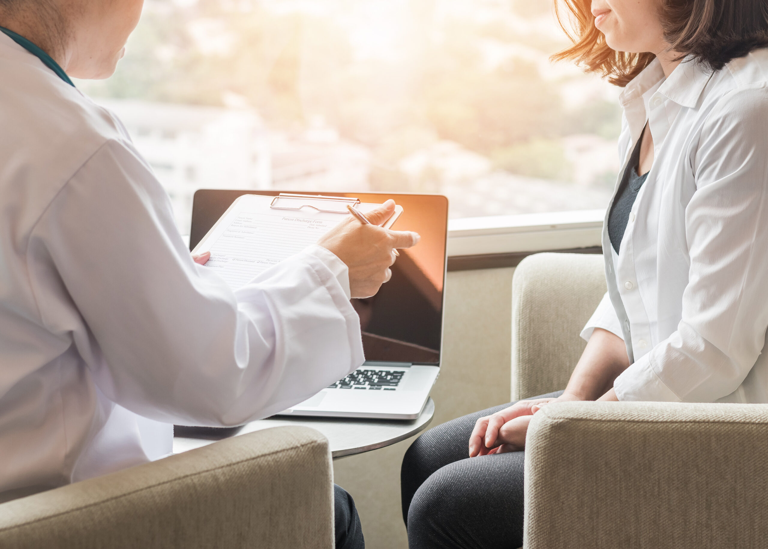 Doctor (obstetrician, gynecologist or psychiatrist) consulting and diagnostic examining female patient's on woman’s obstetric-gynecological health in medical clinic hospital healthcare service